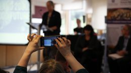 Audience member takes a photo of Claudia Beamish MSP as she chairs the Futures Forum event on Our Food Future. Pic - Fiona MacLellan