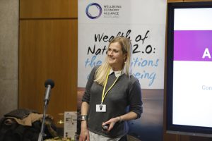 Photo of Katherine Trebeck speaking at our wellbeing economy event